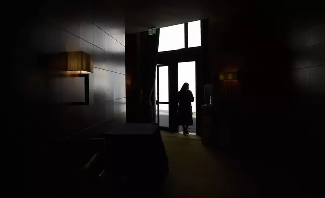 A nun walks during a congress of nearly 900 superiors of the world's female religious orders in Rome, Monday, May 5, 2025. (AP Photo/Alessandra Tarantino)