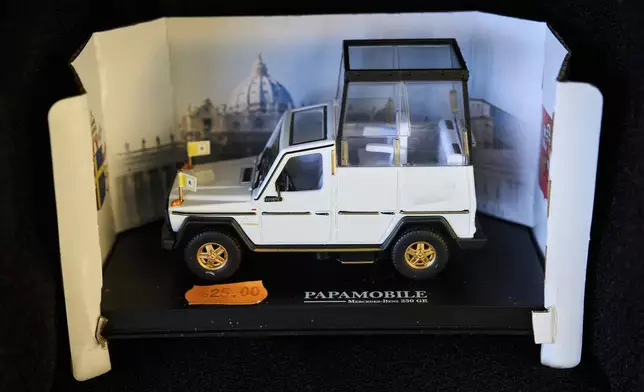 A scale car of the popemobile in Rome, Thursday, May 1, 2025. (AP Photo/Bernat Armangue)