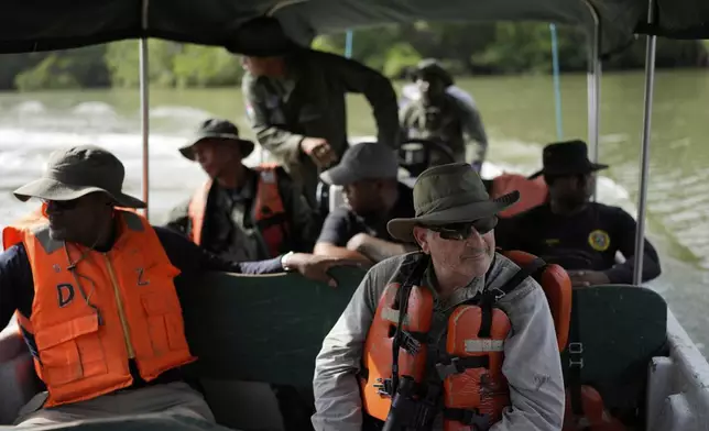 Panama's Environment Minister Juan Carlos Navarro tours Punta Patino, Panama, Saturday, April 5, 2025. (AP Photo/Matias Delacroix)