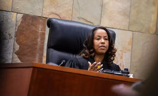 Judge Christina Mims declares a mistrial after the jury could not reach a verdict in the murder trial for former Grand Rapids Police officer Christopher Schurr at the Kent County Courthouse in Grand Rapids, Mich., Thursday, May 8, 2025. (Joel Bissell/MLive.com/Kalamazoo Gazette via AP)