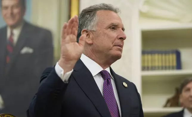 Steve Witkoff is sworn as special envoy by Secretary of State Marco Rubio during a ceremony in the Oval Office of the White House with President Donald Trump, Tuesday, May 6, 2025, in Washington. (AP Photo/Mark Schiefelbein)