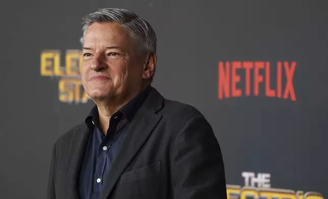 FILE - Ted Sarandos arrives at the premiere of "The Electric State" on Monday, Feb. 24, 2025, at The Egyptian Theatre in Los Angeles. (Photo by Jordan Strauss/Invision/AP, File)
