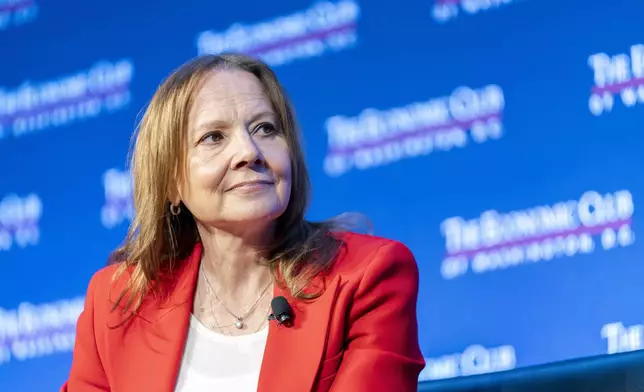 FILE- Mary Barra, chair and CEO of General Motors, talks to David Rubenstein during an interview hosted by the Economic Club of Washington, Wednesday, Dec. 13, 2023, in Washington. (AP Photo/Stephanie Scarbrough, File)