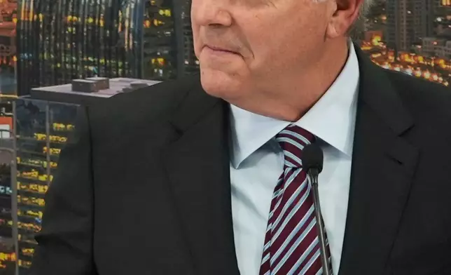 FILE - General Electric Co. CEO Lawrence Culp Jr. signs a $52 billion deal by Emirates to purchase Boeing aircraft with GE engines, at the Dubai Air Show, in Dubai, United Arab Emirates, Monday, Nov. 13, 2023. (AP Photo/Lujain Jo)