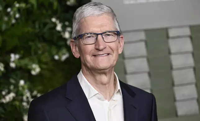 FILE - Tim Cook attends the WSJ. Magazine Innovators Awards at the Museum of Modern Art on Tuesday, Oct. 29, 2024, in New York. (Photo by Evan Agostini/Invision/AP, File)
