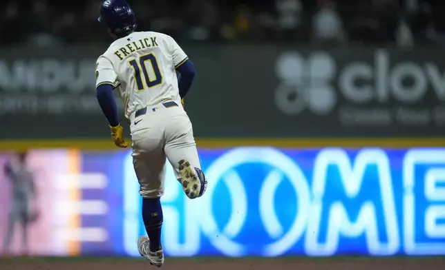 Milwaukee Brewers' Sal Frelick rounds the bases after hitting a two-run home run during the fourth inning of a baseball game against the Baltimore Orioles, Tuesday, May 20, 2025, in Milwaukee. (AP Photo/Aaron Gash)
