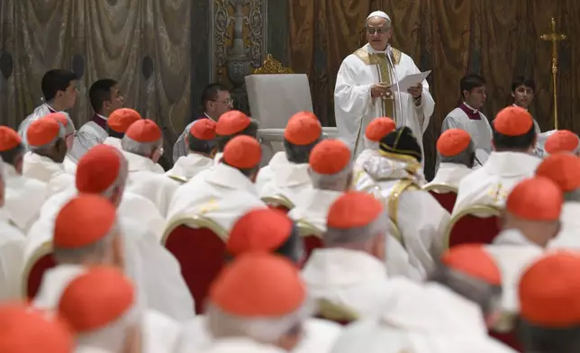 Newly elected Pope Leo XIV concelebrates Mass with the College of Cardinals inside the Sistine Chapel at the Vatican the day after his election as 267th pontiff of the Roman Catholic Church, Friday, May 9, 2025. (Vatican Media via AP)