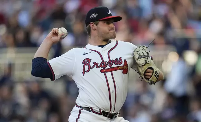 Atlanta Braves pitcher Bryce Elder (55) works against the Los Angeles Dodgers in the first inning of a baseball game, Sunday, May 4, 2025, in Atlanta. (AP Photo/Mike Stewart)