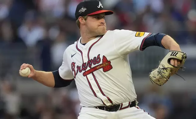 Atlanta Braves pitcher Bryce Elder (55) works against the Los Angeles Dodgers in the fourth inning of a baseball game, Sunday, May 4, 2025, in Atlanta. (AP Photo/Mike Stewart)