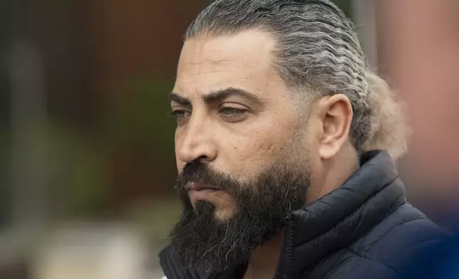 Odai Al Fayoumi, father of Wadee Al Fayoumi, who was murdered by Joseph Czuba in 2023, speaks to the media after the sentencing of Czuba outside the Will County Courthouse in Joliet, Ill., Friday, May 2, 2025. (Pat Nabong /Chicago Sun-Times via AP)