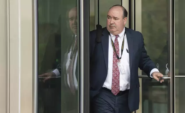 Will County Prosecutor Christopher Koch exits the Will County Courthouse after the sentencing of Joseph Czuba in Joliet, Ill., Friday, May 2, 2025. (Pat Nabong /Chicago Sun-Times via AP)