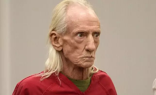 FILE - Joseph Czuba, 71, stands before Circuit Judge Dave Carlson for his arraignment at the Will County, Ill., courthouse, Oct. 30, 2023, in Joliet, Ill. (AP Photo/Charles Rex Arbogast, File)