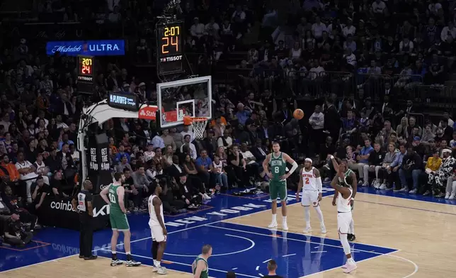New York Knicks' Mitchell Robinson shoots a free throw during the second half of Game 3 of an NBA basketball second-round playoff series against the Boston Celtics, Saturday, May 10, 2025, in New York. (AP Photo/Pamela Smith)
