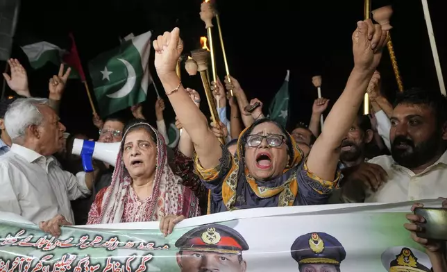 People celebrate Pakistan and India reaching a ceasefire deal, during a demonstration in Karachi, Pakistan, Saturday, May 10, 2025. (AP Photo/Fareed Khan)