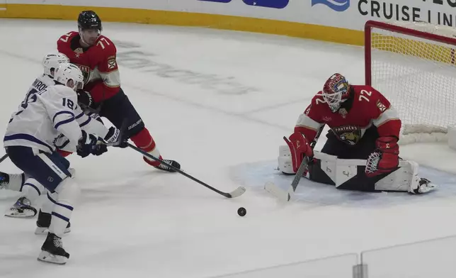 Florida Panthers goaltender Sergei Bobrovsky (72) deflects a shot ny Toronto Maple Leafs center Steven Lorentz (18) during the third period in Game 3 of a second-round NHL hockey playoff series, Friday, May 9, 2025, in Sunrise, Fla. (AP Photo/Marta Lavandier)