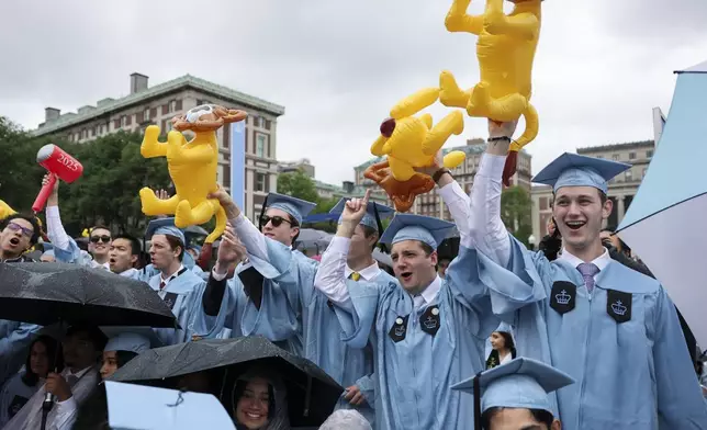 Students attend Columbia University commencement ceremony on Columbia's main campus, in Manhattan, on Wednesday, May 21, 2025 in New York. (Jeenah Moon/Pool Photo via AP)