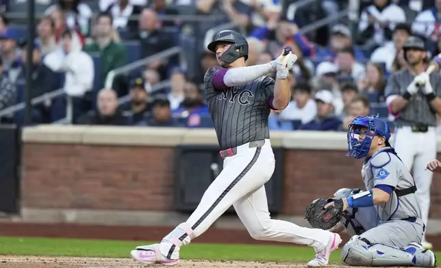 New York Mets' Pete Alonso watches his two-run home run during the first inning of a baseball game against the Los Angeles Dodgers, Sunday, May 25, 2025, in New York. (AP Photo/Seth Wenig)