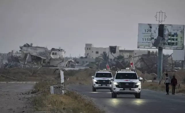 Red Cross vehicles carrying American-Israeli hostage and soldier Edan Alexander leave the Gaza Strip after he was handed over to the organization, Monday, May 12, 2025. (AP Photo/Abdel Kareem Hana)