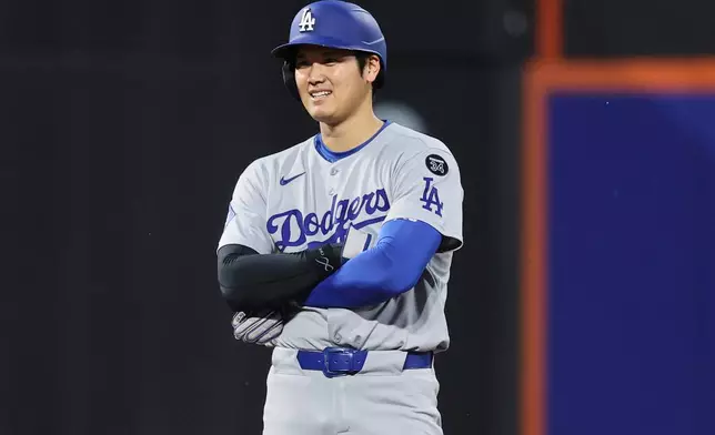 Los Angeles Dodgers' Shohei Ohtani stands on second base during the third inning of a baseball game against the New York Mets Friday, May 23, 2025, in New York. (AP Photo/Pamela Smith)