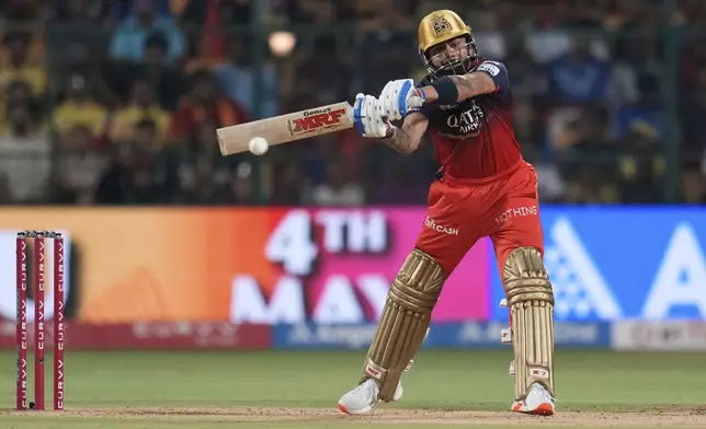 Royal Challengers Bengaluru's Virat Kohli plays a shot during the Indian Premier League cricket match between Royal Challengers Bengaluru and Chennai Super Kings at Chinnaswamy Stadium in Bengaluru, India, Saturday, May 3, 2025. (AP Photo/Aijaz Rahi)