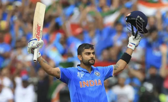 FILE - India's Virat Kohli, celebrates his hundred runs during the World Cup Pool B match against Pakistan in Adelaide, Australia, on Feb. 15, 2015. (AP Photo/James Elsby, File)