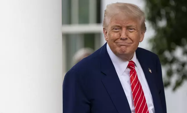 President Donald Trump speaks with reporters in front of the West Wing of the White House, Thursday, May 8, 2025, in Washington. (AP Photo/Alex Brandon)