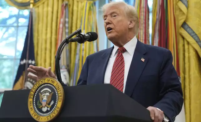 President Donald Trump speaks after David Perdue was sworn in as U.S. Ambassador to China during a ceremony in the Oval Office of the White House, Wednesday, May 7, 2025, in Washington. (AP Photo/Mark Schiefelbein)