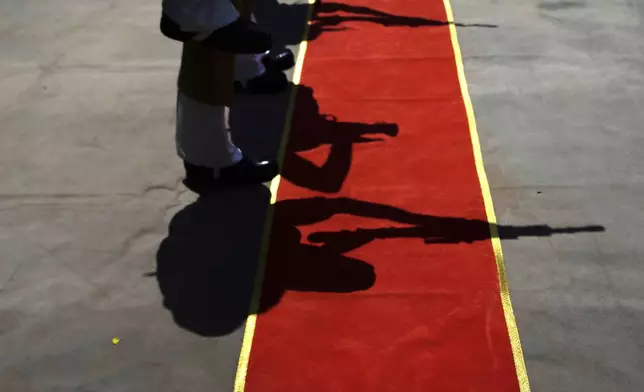 Indian Border Security Force (BSF) soldiers pay tribute during the wreath-laying ceremony of their colleague Deepak Chimngakham, who was killed in cross border Pakistani artillery shelling, in Jammu, Monday, May 12, 2025. (AP Photo/Channi Anand)