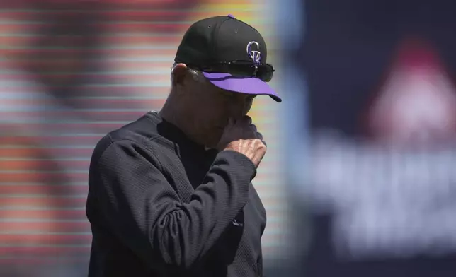 Colorado Rockies manager Bud Black walks toward the dugout after making a pitching change during the fifth inning of a baseball game against the San Francisco Giants in San Francisco, Sunday, May 4, 2025. (AP Photo/Jeff Chiu)