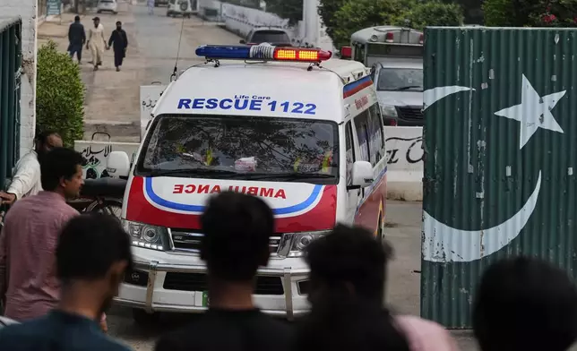 Ambulances leave from a complex near the site of a suspected Indian missile attack, in Muridke, a town in Pakistan's Punjab province, Wednesday, May 7, 2025. (AP Photo/K.M. Chaudary)