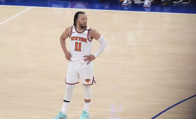 New York Knicks guard Jalen Brunson (11) reacts during the fourth quarter of Game 2 of the NBA basketball Eastern Conference final against the Indiana Pacers, Friday, May 23, 2025, in New York. (AP Photo/Frank Franklin II)