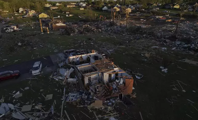Destroyed homes are seen after a severe storm passed through the area, Saturday, May 17, 2025, in London, Ky. (AP Photo/Carolyn Kaster)