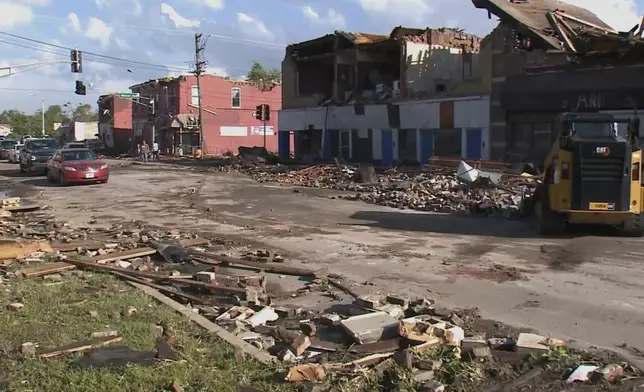 Debris covers the ground after a severe storm passed the area on Saturday, May 17, 2025 in St. Louis, Mo. ( KMOV via AP)
