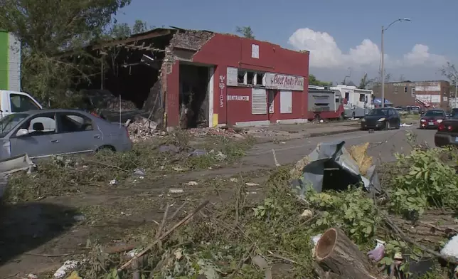 Debris covers the ground after a severe storm passed the area on Saturday, May 17, 2025 in St. Louis, Mo. ( KMOV via AP)