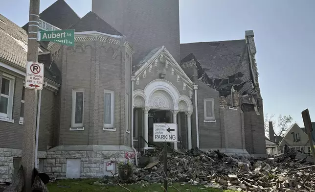 Part of Centennial Christian Church in St. Louis, Missouri, collapsed on Friday, May 16, 2025 when severe storms, including a possible tornado, swept through the city. (AP Photo/Michael Phillis)