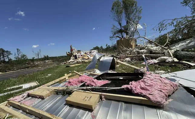 Houses lay destroyed following severe weather in London, Kentucky, Saturday, May 17, 2025. (AP Photo/Dylan Lovan)