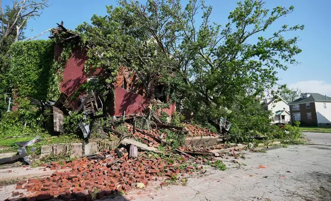 Debris is seen after a severe storm moved through Friday, May 16, 2025, in St. Louis. (AP Photo/Jeff Roberson)