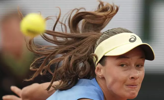 Turkey's Zeynep Sonmez returns the ball to Ukraine's Elina Svitolina during their first round match of the French Tennis Open at Suzanne-Lenglen court at the Roland Garros stadium, in Paris, Sunday May 25, 2025. (AP Photo/Christophe Ena)