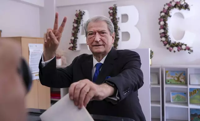 Sali Berisha, leader of Democratic Party of Albania, casts his ballot during a general election where rival Socialist Edi Rama is seeking a fourth term as Albania's prime minister in Tirana, Sunday, May 11, 2025. (AP Photo)