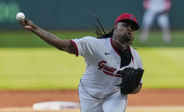 Cleveland Guardians' Luis Ortiz pitches in the first inning of a baseball game against the Philadelphia Phillies in Cleveland, Sunday, May 11, 2025. (AP Photo/Sue Ogrocki)