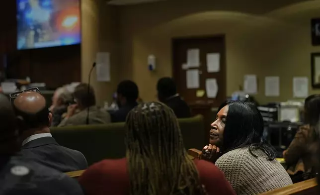 RowVaughn Wells, right, mother of Tyre Nichols, listens during the trial of three former Memphis police officers accused in the 2023 fatal beating of her son, Wednesday, April 30, 2025, in Memphis, Tenn. (AP Photo/George Walker IV, Pool)
