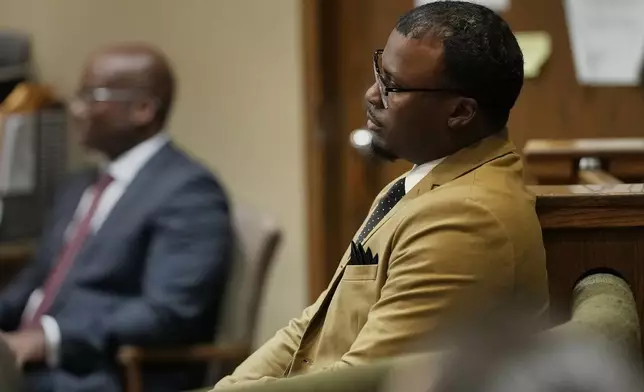 Former Memphis police officer Justin Smith Jr., one of three former Memphis officers charged with fatally beating Tyre Nichols in 2023, sits in the courtroom, Wednesday, April 30, 2025, in Memphis, Tenn. (AP Photo/George Walker IV, Pool)
