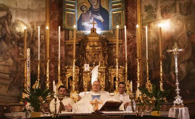 Cardinal Peter Erdo leads a mass at his titular church of Santa Francesca Romana in Rome, Sunday, May 4, 2025. (AP Photo/Francisco Seco)