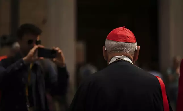 Cardinal Louis Raphael Sako leaves the Vatican on Monday, May 5, 2025, after attending the General Congregation of cardinals in the New Synod Hall where they are preparing for the upcoming conclave starting on May 7, to elect the 267th Roman pontiff. (AP Photo/Francisco Seco)