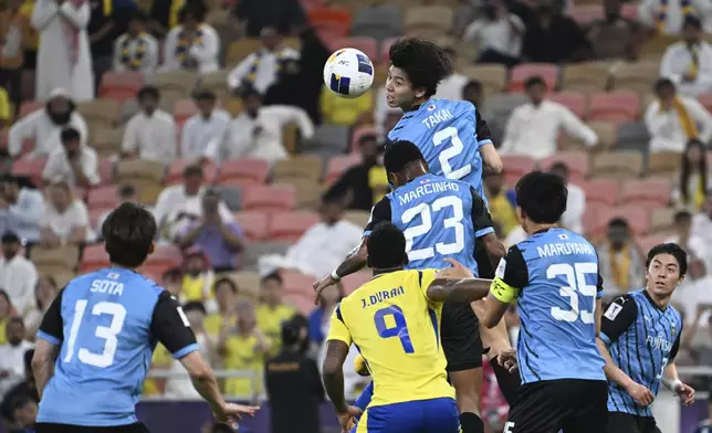 Kawasaki Frontale's Kota Takai (2) rises above to head the ball during a AFC Champions League Elite semifinal soccer match against Al Nassr at Alinma Stadium in Jeddah, Saudi Arabia, Wednesday, April 30, 2025. (AP Photo/Ali Issa)