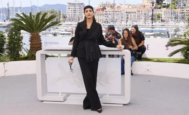 Parinaz Izadyar poses for photographers at the photo call for the film 'Woman and Child' at the 78th international film festival, Cannes, southern France, Friday, May 23, 2025. (Photo by Joel C Ryan/Invision/AP)