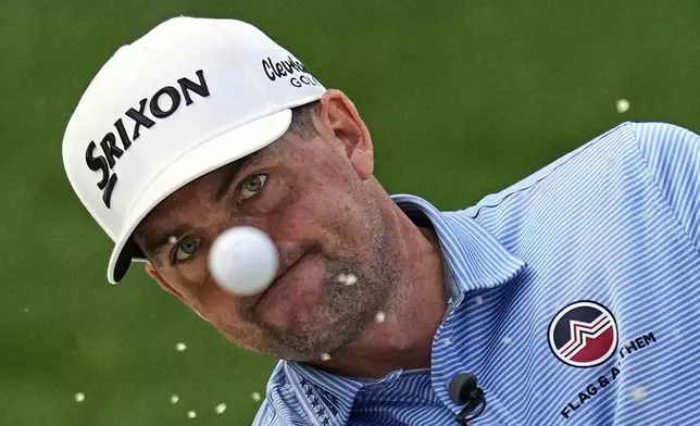 Keegan Bradley hits from the bunker on the 13th hole during a practice round for the PGA Championship golf tournament at the Quail Hollow Club, Tuesday, May 13, 2025, in Charlotte, N.C. (AP Photo/David J. Phillip)