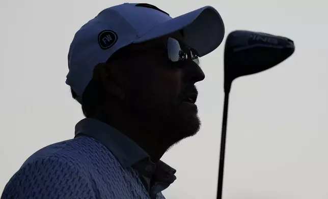 Phil Mickelson watches his tee shot on the 10th hole during the first round of the PGA Championship golf tournament at the Quail Hollow Club, Thursday, May 15, 2025, in Charlotte, N.C. (AP Photo/David J. Phillip)
