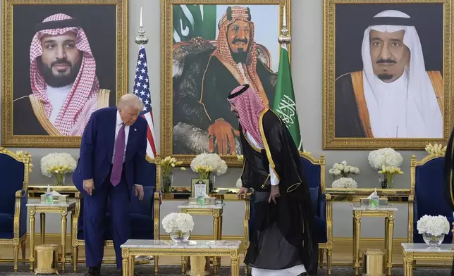 President Donald Trump arrives with Saudi Crown Prince Mohammed bin Salman for a coffee ceremony at the Royal Terminal of King Khalid International Airport in Riyadh, Saudi Arabia, Tuesday, May 13, 2025. (AP Photo/Alex Brandon)