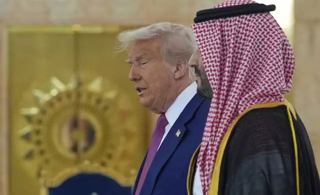 President Donald Trump arrives with Saudi Crown Prince Mohammed bin Salman for a coffee ceremony at the Royal Terminal of King Khalid International Airport in Riyadh, Saudi Arabia, Tuesday, May 13, 2025